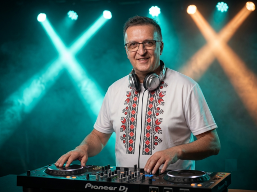 DJ, Person standing behind Pioneer DJ mixer controller (OK, DJ Zsilla)1